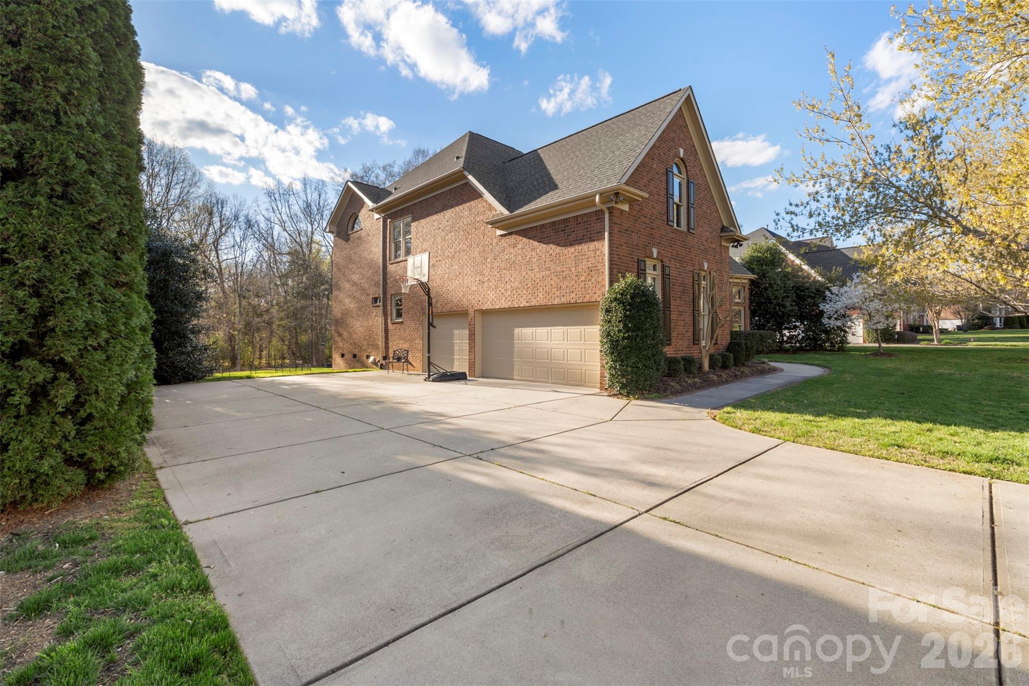 1716 Hickory Ridge Drive Waxhaw, NC 28173 - Photo 45 of 48 a view of a house with a yard