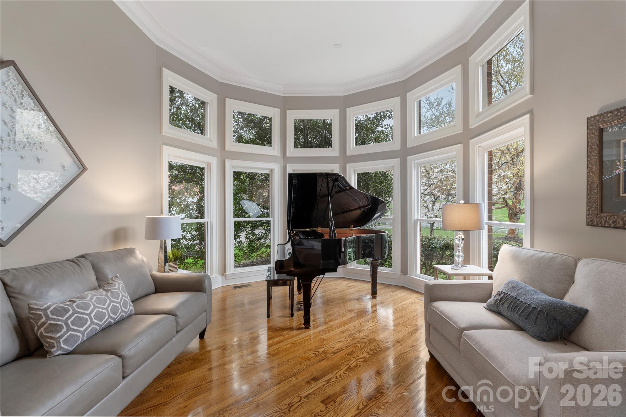 1716 Hickory Ridge Drive Waxhaw, NC 28173 - Photo 5 of 48 a living room with furniture and a large window
