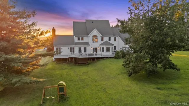 a view of a house with a ocean view