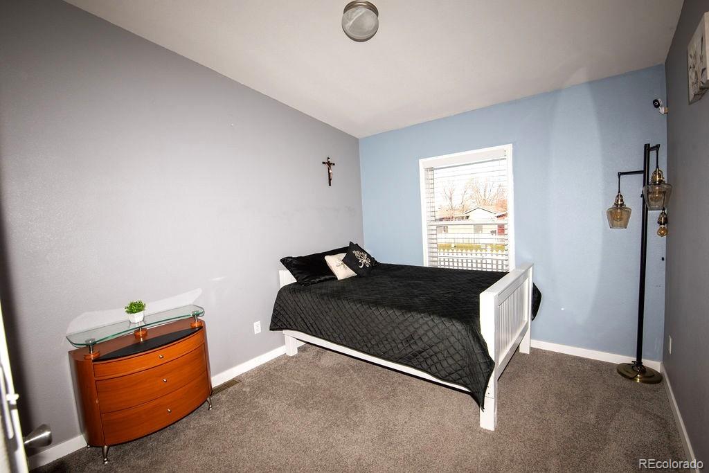 7725 Primrose Green, Unit 165 Frederick, CO 80530 - Photo 16 of 22 a living room with furniture