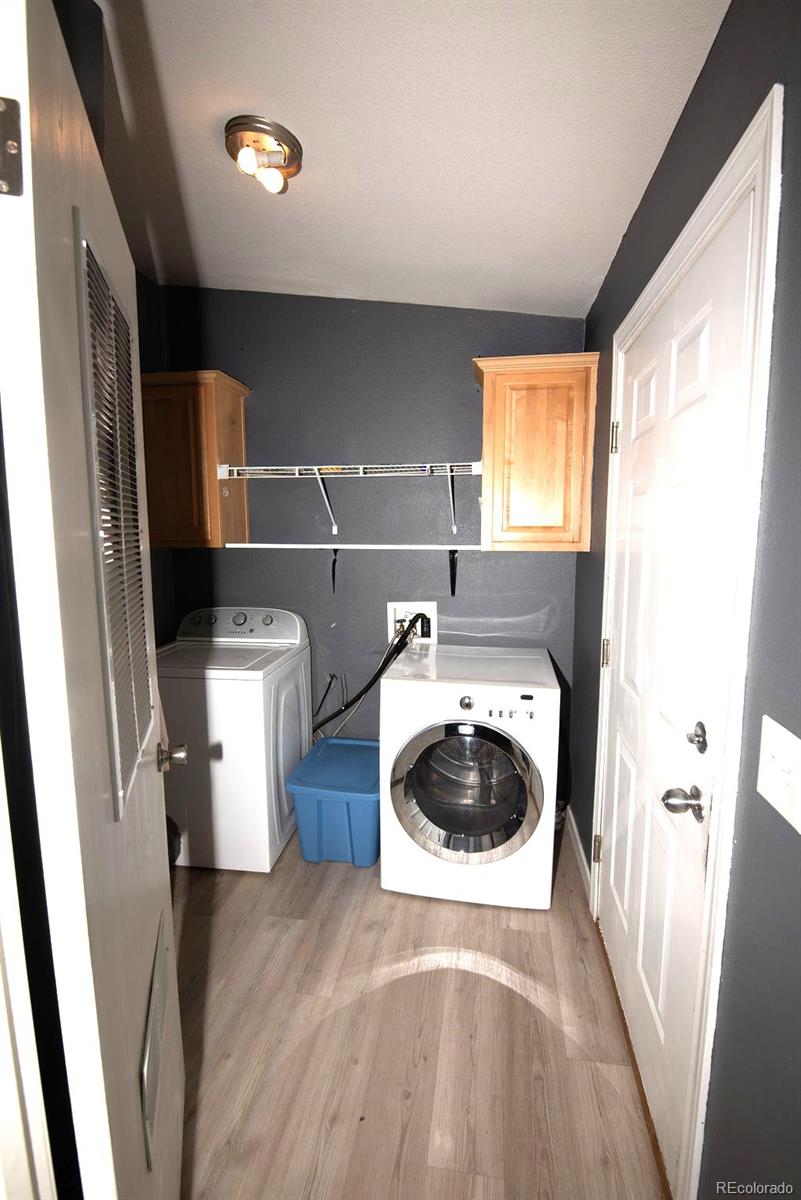 7725 Primrose Green, Unit 165 Frederick, CO 80530 - Photo 18 of 22 a bathroom with a sink and a toilet
