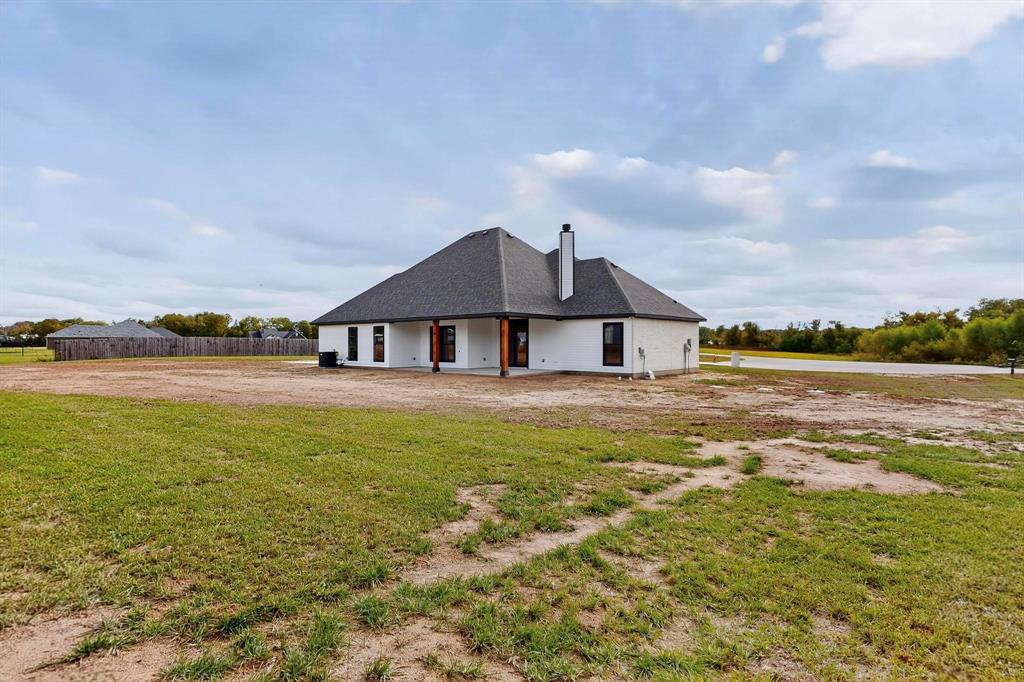 178 Private Road Canton, TX 75103 - Photo 32 of 38 a front view of a house with a big yard