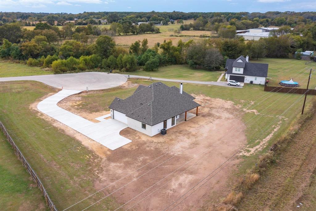 178 Private Road Canton, TX 75103 - Photo 35 of 38 an aerial view of a house with a lake view