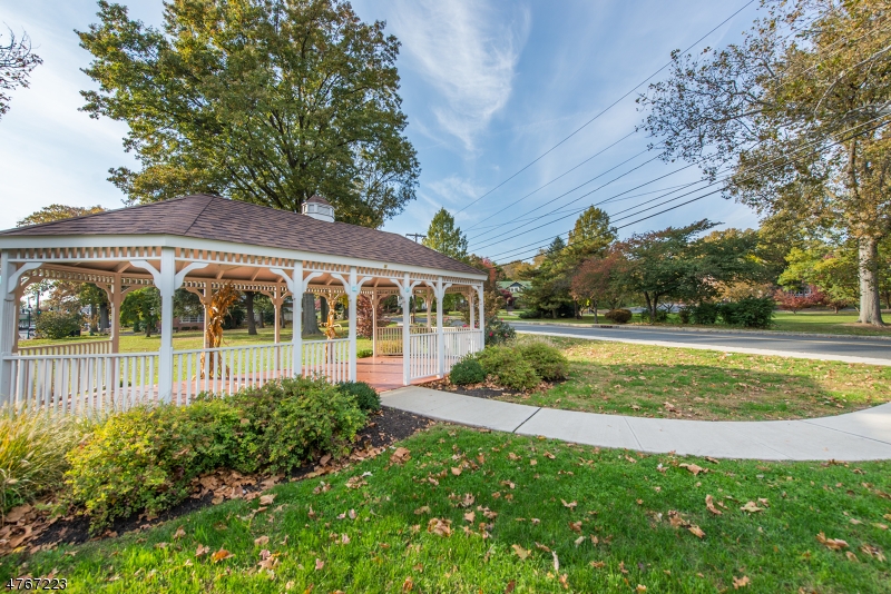 1677 Springfield Avenue, Unit 14 Maplewood, NJ 07040 - Photo 13 of 13 a view of a house with a garden