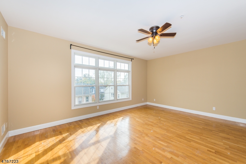 1677 Springfield Avenue, Unit 14 Maplewood, NJ 07040 - Photo 3 of 13 a view of a livingroom with a window