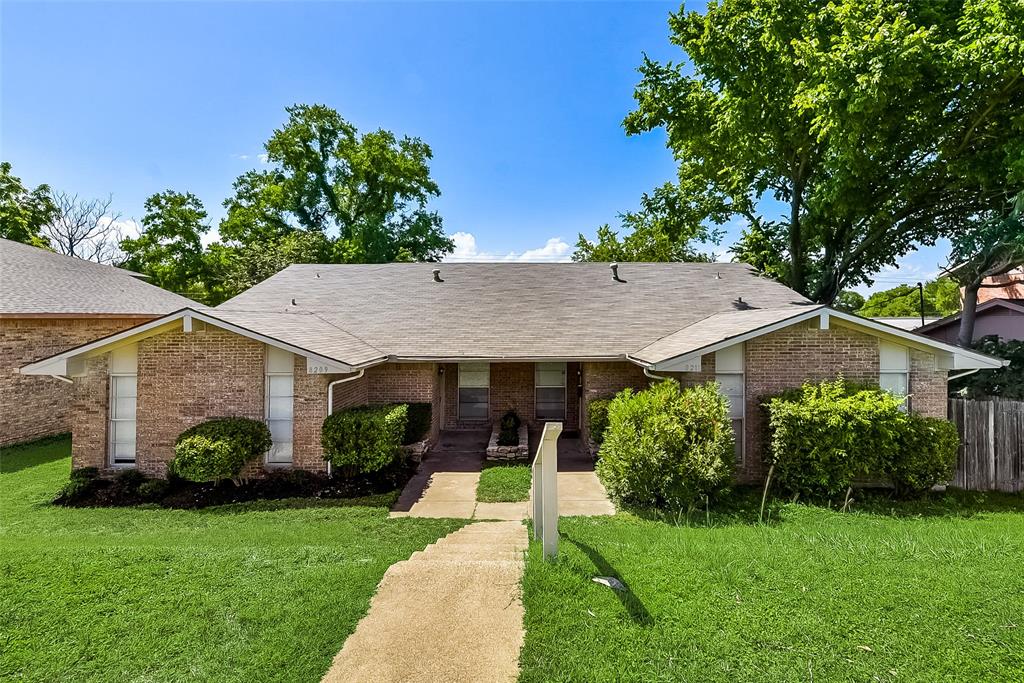 8209 Ferguson Road Dallas, TX 75228 - Photo 1 of 1 a view of a house with a big yard plants and large trees