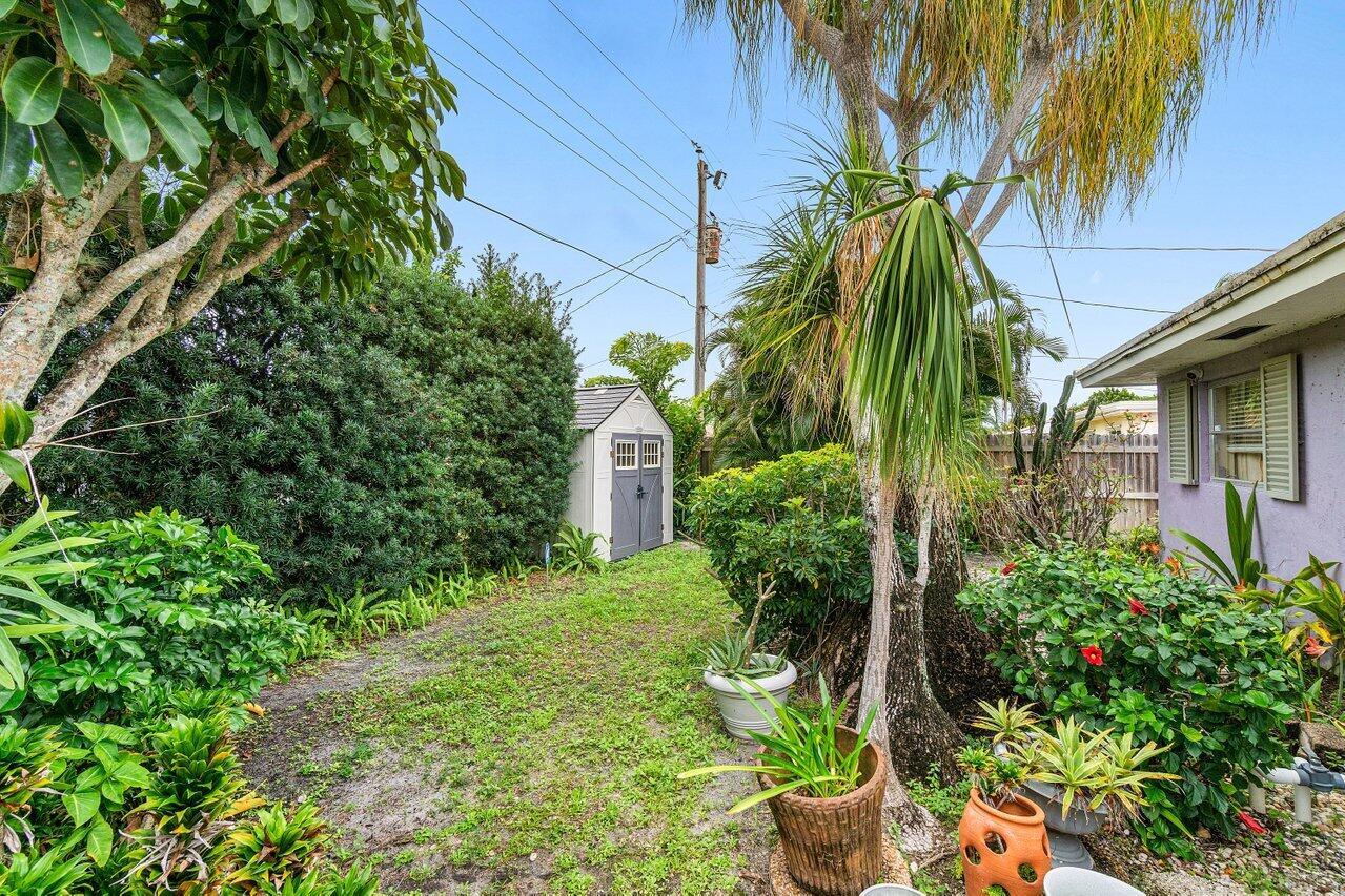1220 Southwest 25th Place Boynton Beach, FL 33426 - Photo 31 of 62 Backyard Storage
