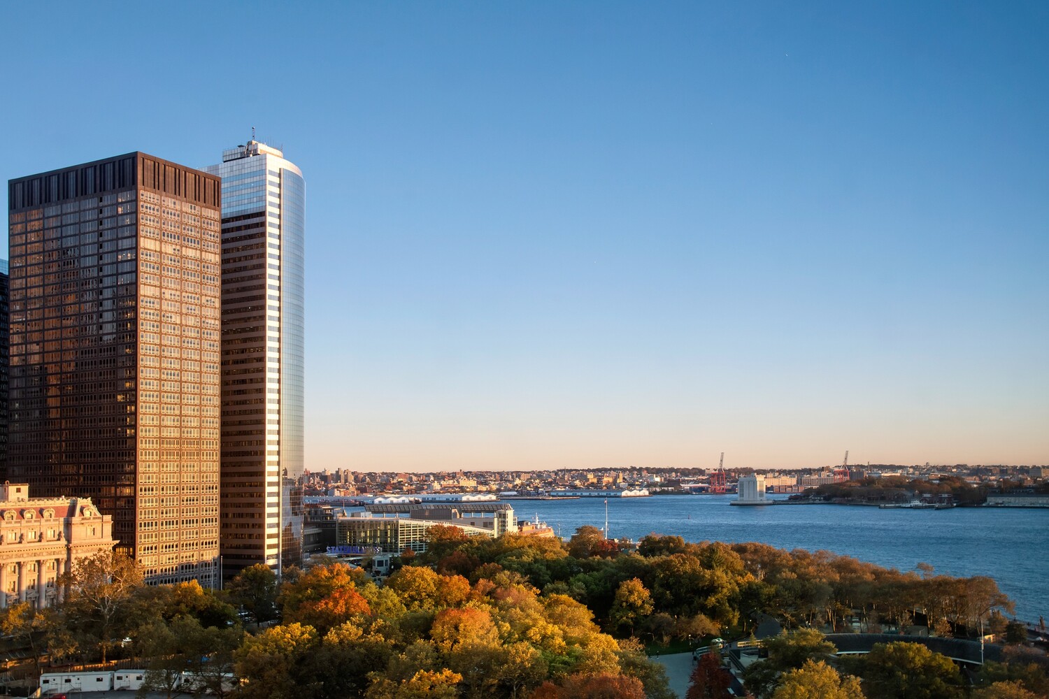 10 West Street, Unit 15C Manhattan, NY 10004 - Photo 12 of 23 a view of city with tall buildings