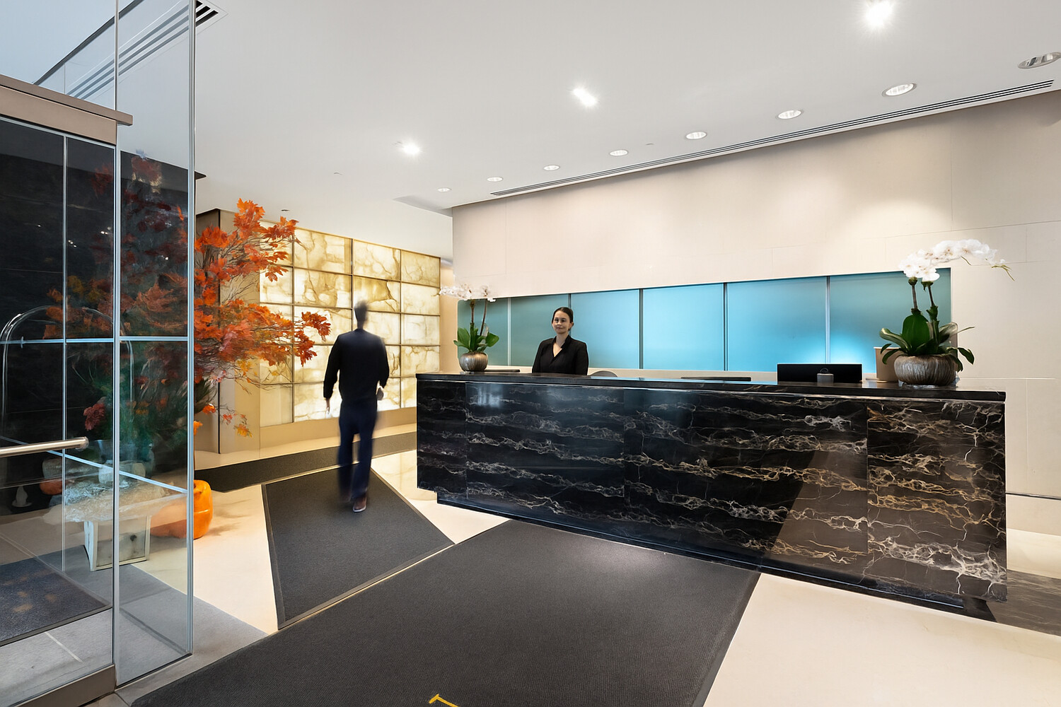 10 West Street, Unit 15C Manhattan, NY 10004 - Photo 17 of 23 a living room with stainless steel appliances granite countertop a barbecue grill and cabinets