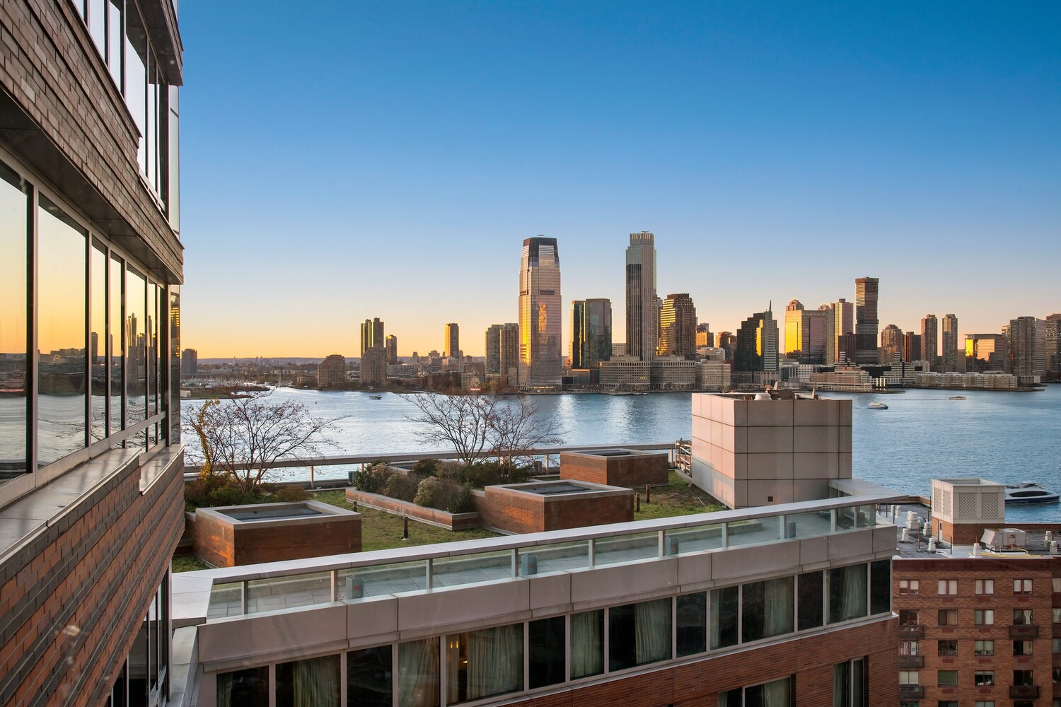 10 West Street, Unit 15C Manhattan, NY 10004 - Photo 4 of 23 a view of city with tall buildings