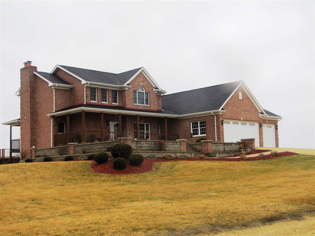 19085 East Crill Road Monroe Center, IL 61052 - Photo 1 of 23 a front view of a house with swimming pool