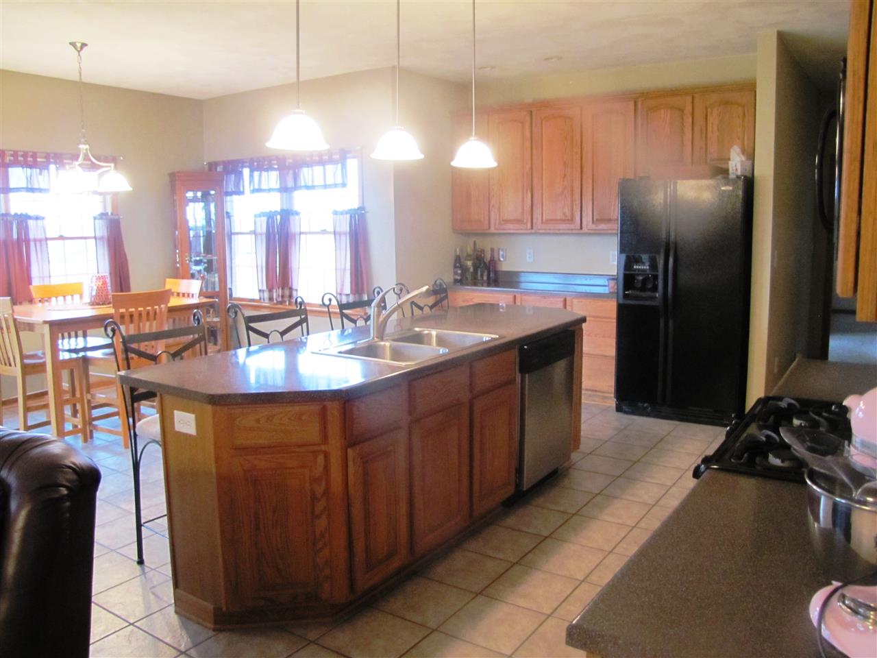 19085 East Crill Road Monroe Center, IL 61052 - Photo 3 of 23 a kitchen with a sink appliances and cabinets