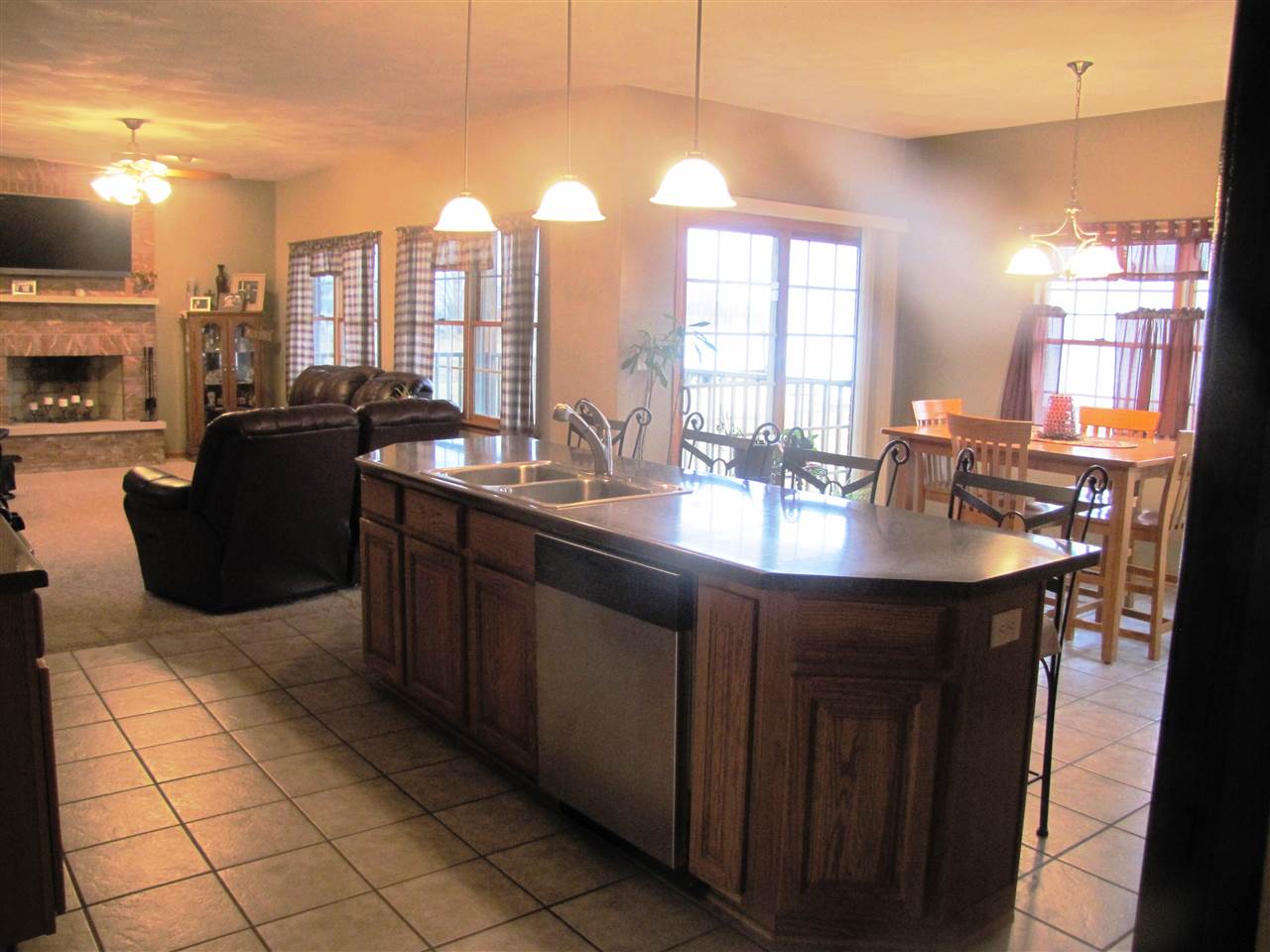 19085 East Crill Road Monroe Center, IL 61052 - Photo 4 of 23 a kitchen with a sink cabinets and appliances