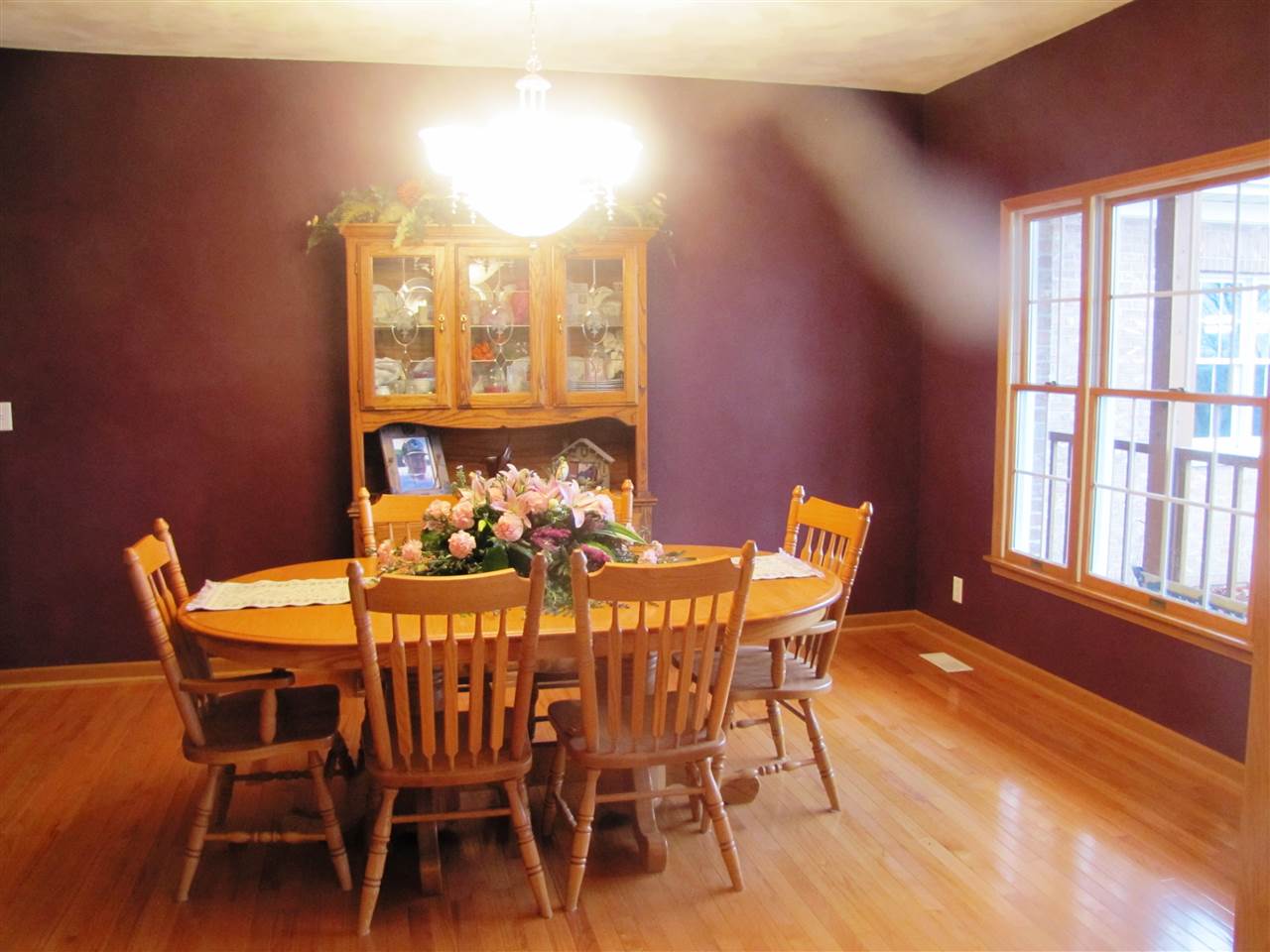 19085 East Crill Road Monroe Center, IL 61052 - Photo 8 of 23 a view of a dining room with furniture window and outside view
