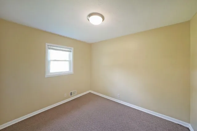 an empty room with a workbench