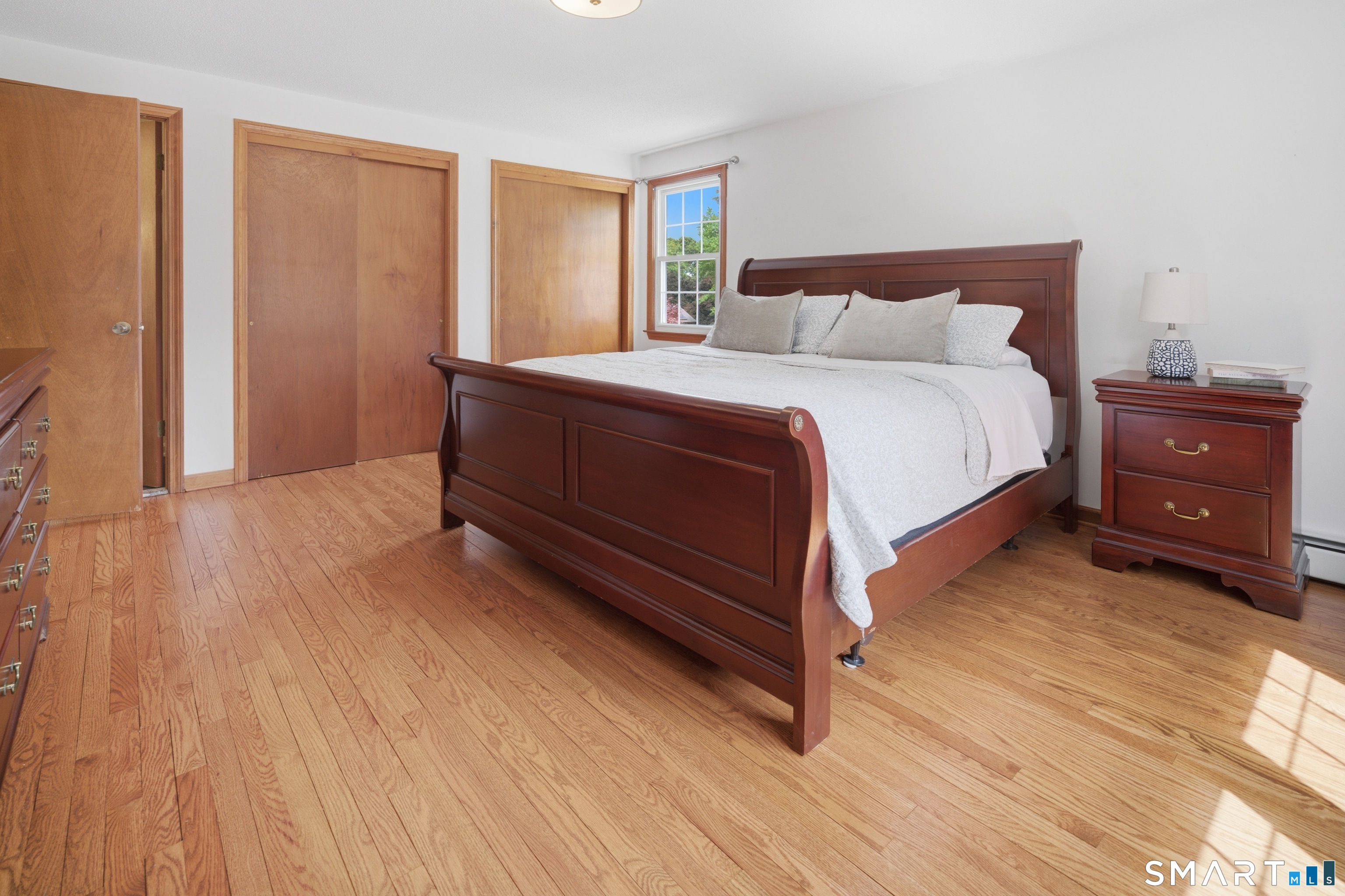 211 Valley View Road Manchester, CT 06040 - Photo 24 of 39 a bedroom with a bed and a closet