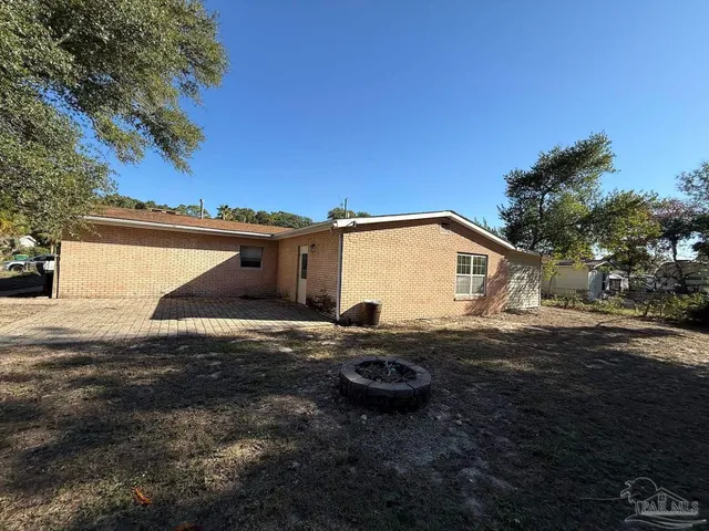 a view of backyard of house