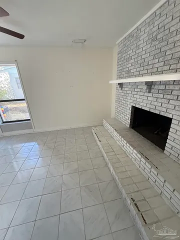 a living room with a fireplace