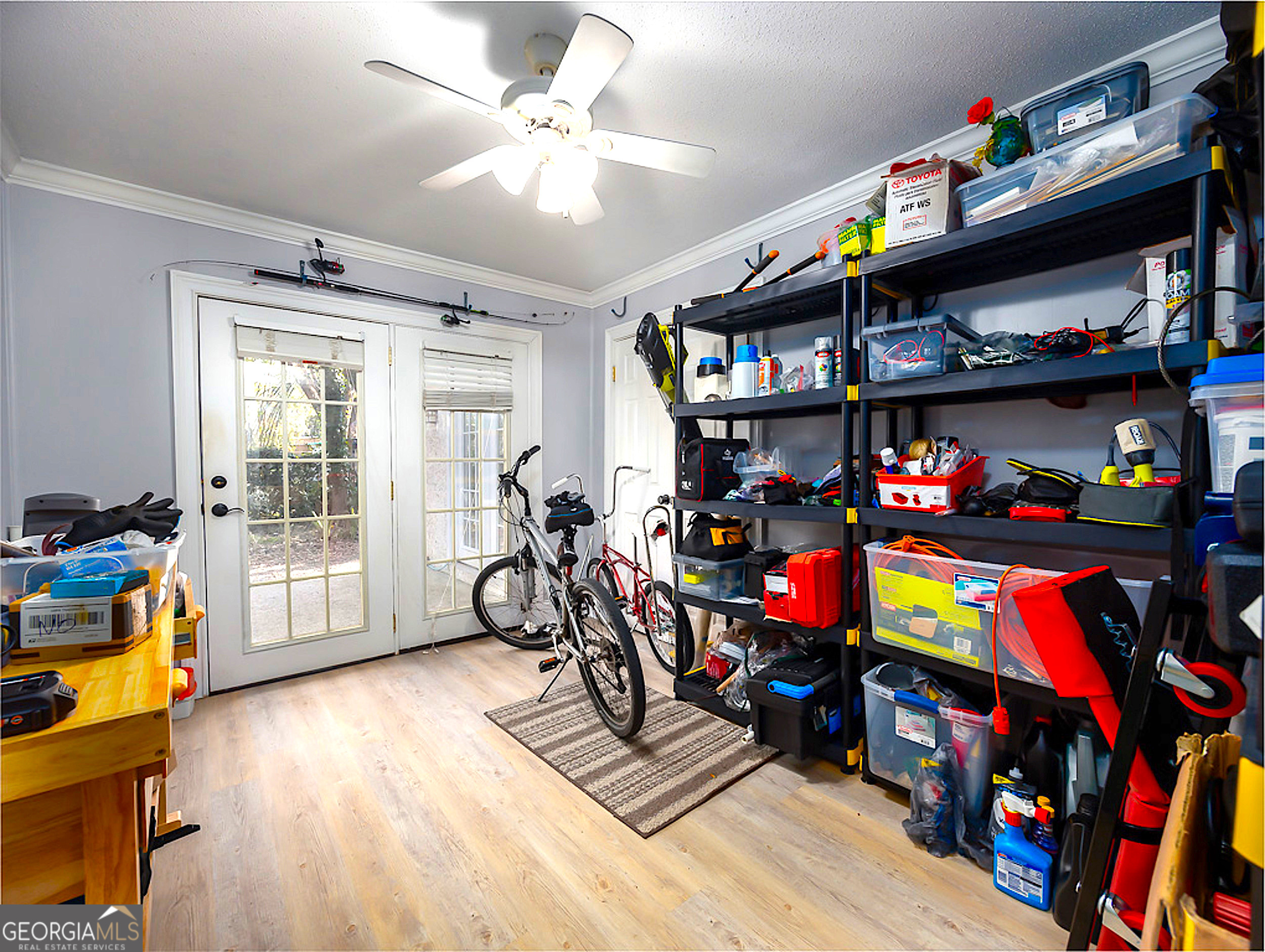 103 Cater Street St. Simons, GA 31522 - Photo 26 of 30 a living room with lots of furniture and a flat screen tv