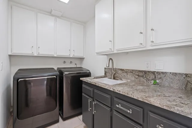 a view of a backyard with sitting area