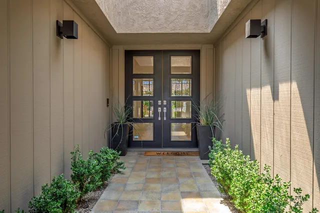 a view of an empty room with shelves