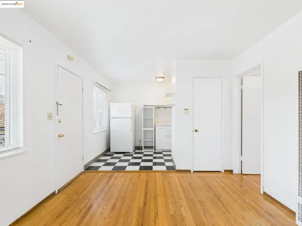a view of a livingroom with a bathroom and a sink