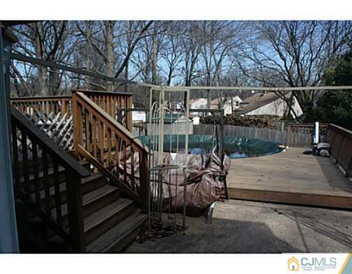31 Phillips Road Edison, NJ 08817 - Photo 3 of 4 a view of house with outdoor space and sitting area