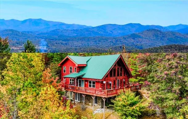 a view of houses with outdoor space and swimming pool