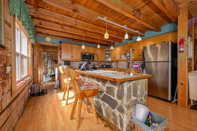 a view of a refrigerator in the kitchen