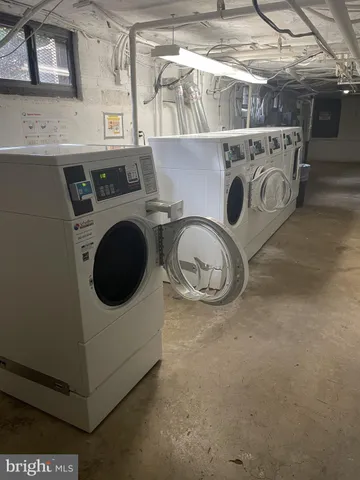 a view of a playground with basketball court