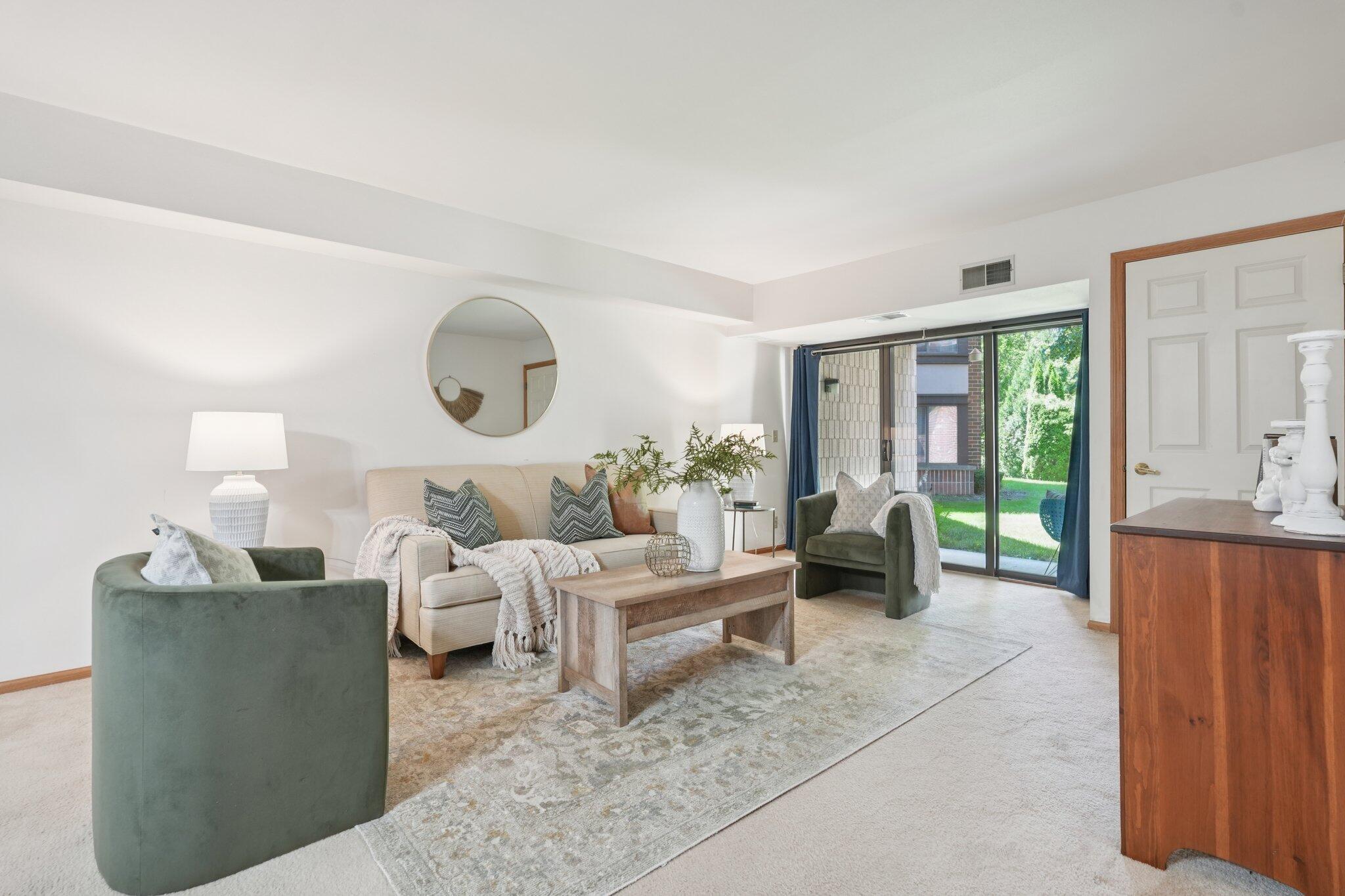 1600 West Green Tree Road, Unit 130 Glendale, WI 53209 - Photo 1 of 1 Living Room w/ Natural Sunlight