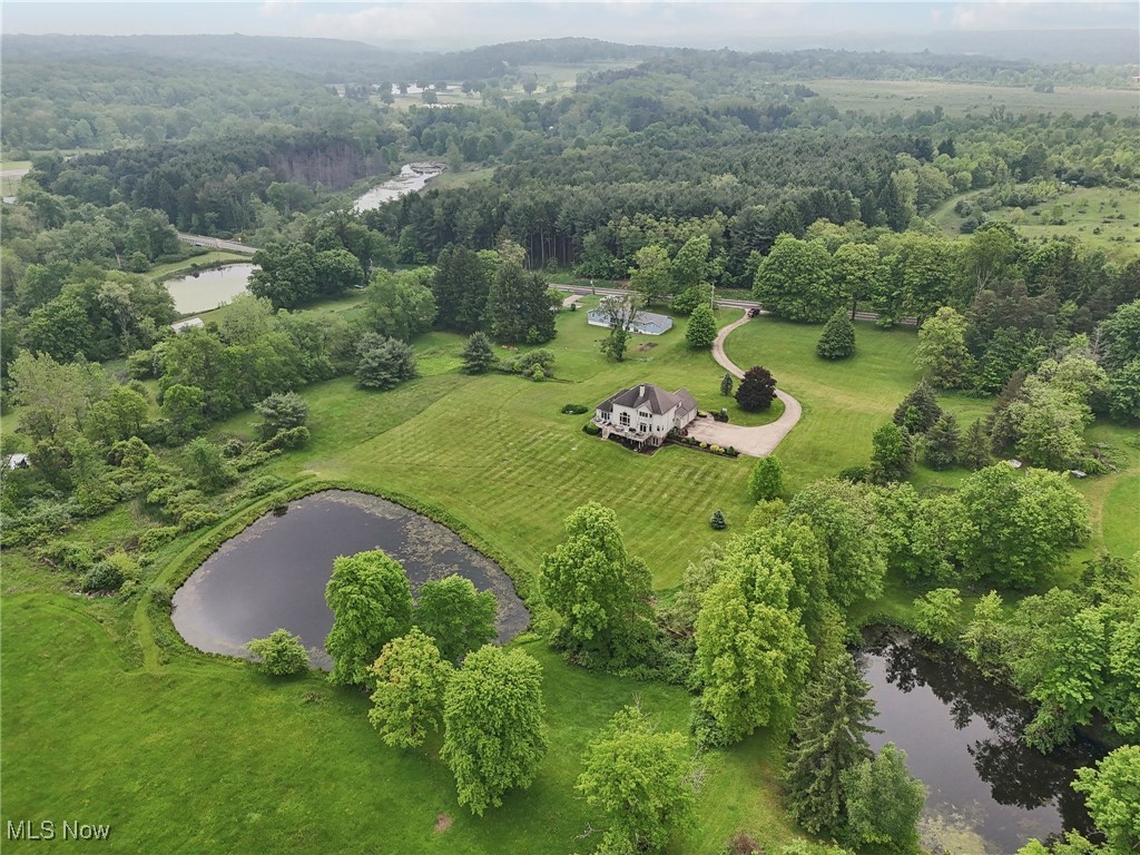 1491 Ridgewood Road Wadsworth, OH 44281 - Photo 32 of 36 Bird's eye view of a nearby body of water and a forest