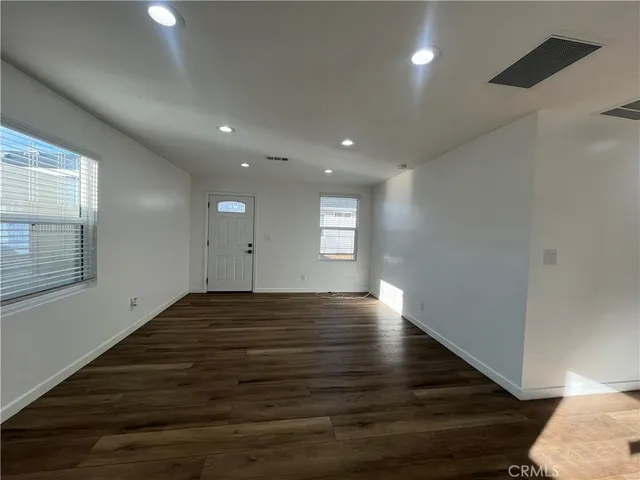 a view of an empty room and window