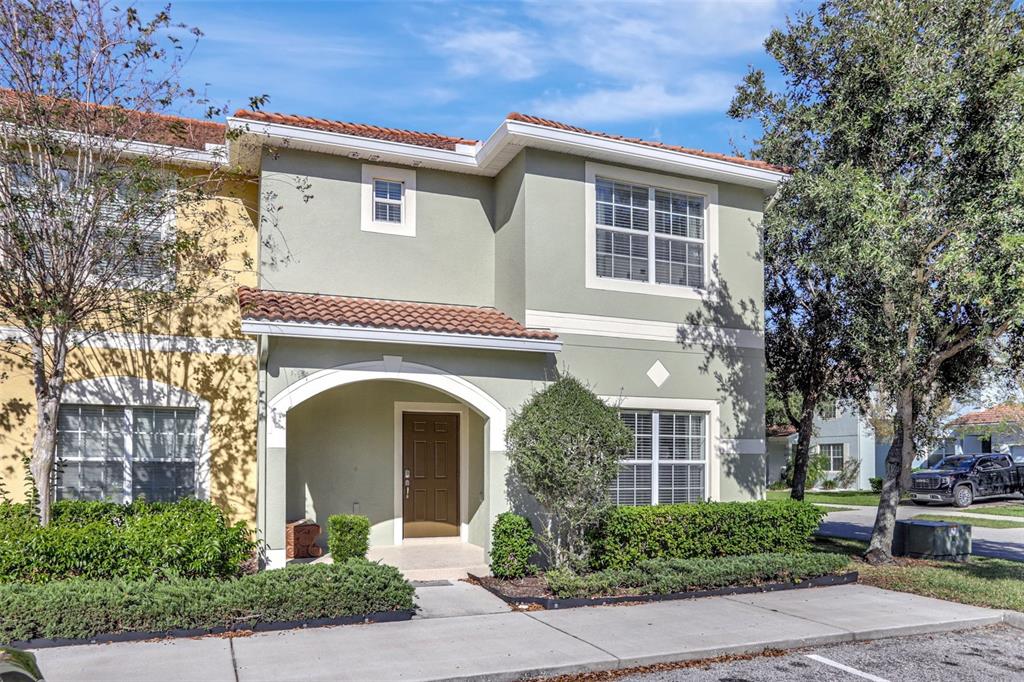 8919 Bismarck Palm Road Kissimmee, FL 34747 - Photo 1 of 1 a front view of a house