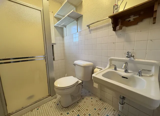 a bathroom with a sink and a toilet