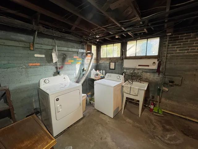 a utility room with dryer and washer