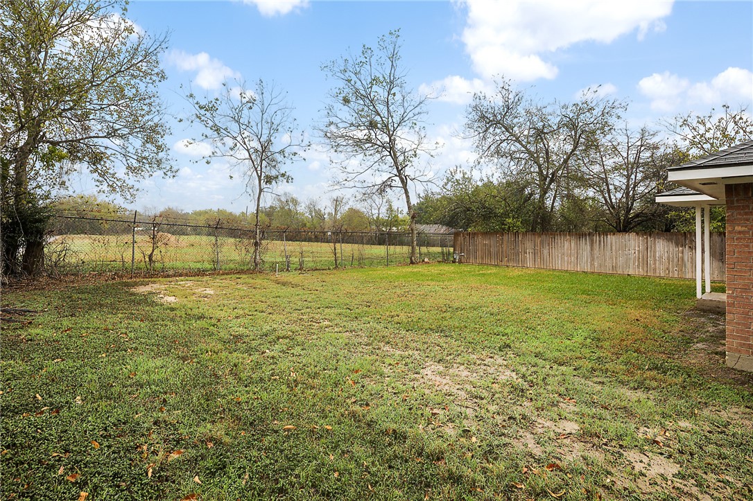 314 Moss Street Bryan, TX 77803 - Photo 18 of 18 a view of a yard with a house