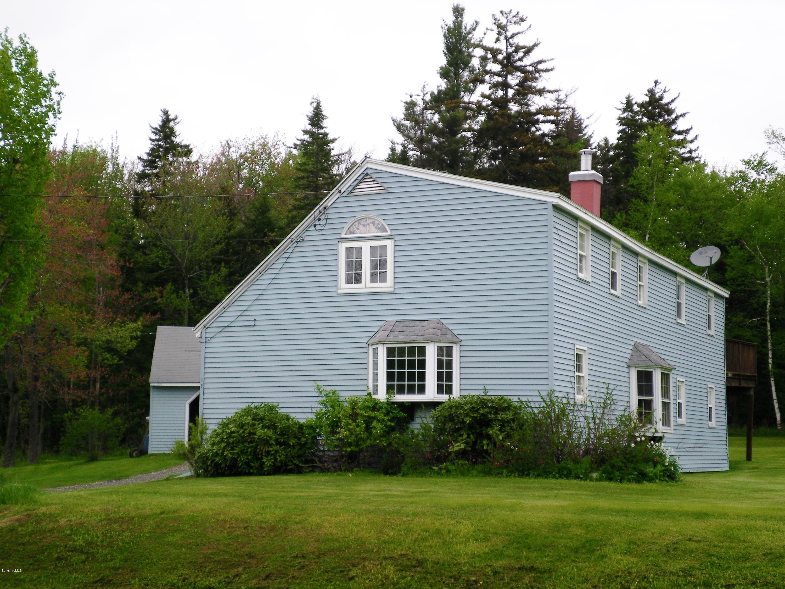 18 West Main Road Peru, MA 01235 - Photo 2 of 23 a house view with a garden space