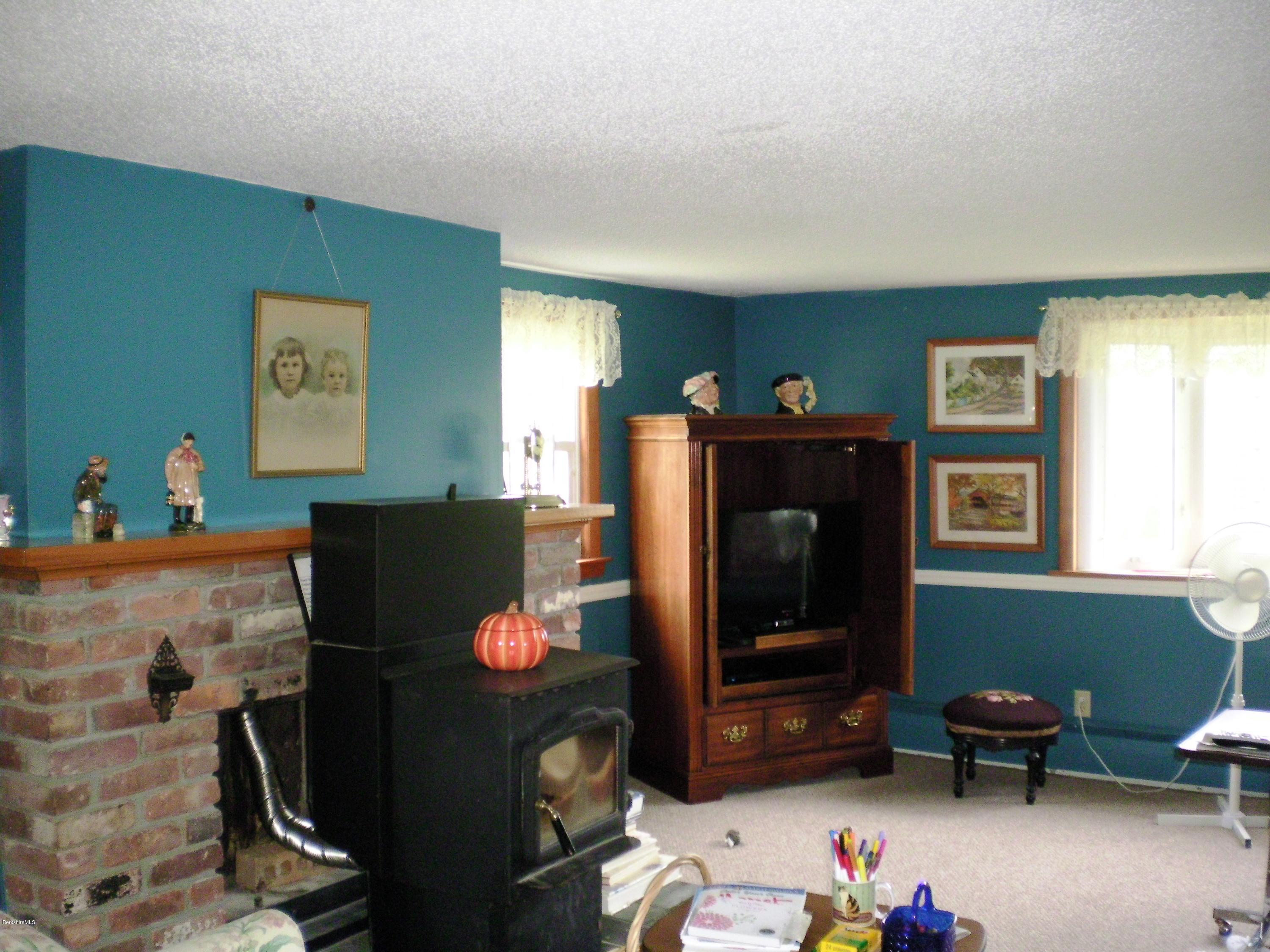 18 West Main Road Peru, MA 01235 - Photo 12 of 23 a living room with furniture and a window