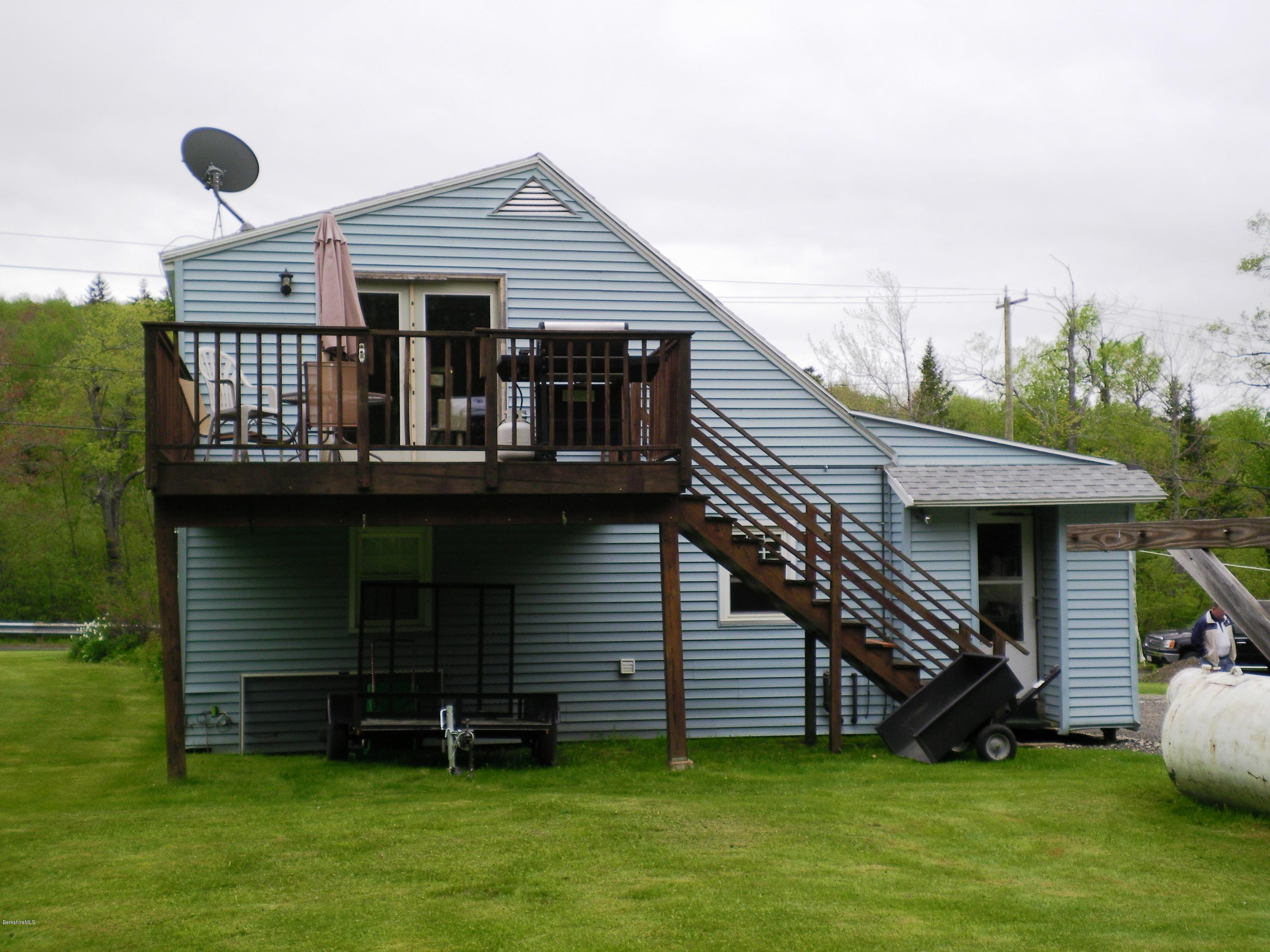 18 West Main Road Peru, MA 01235 - Photo 4 of 23 a view of a house with a backyard