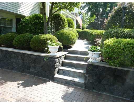 220 Wyngate Road Coraopolis, PA 15108 - Photo 2 of 18 Exterior Front. NEW OMNI-STONE DRIVEWAY AND ATTRACTIVE VOLCANIC ROCK WALL AND SLATE WALK-WAY