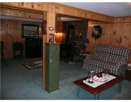 220 Wyngate Road Coraopolis, PA 15108 - Photo 12 of 18 Den/Family/Great Room. PANELED GAMEROOM WITH GAS LOG WOOD BURNER, AND HALF BATH