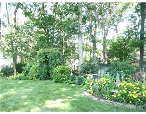 220 Wyngate Road Coraopolis, PA 15108 - Photo 17 of 18 Yard/Garden. BEAUTIFUL GARDENS AND ARBOR TO BACK OF YARD