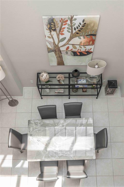 1922 Harbourside Drive, Unit 1102 Longboat Key, FL 34228 - Photo 9 of 23 a kitchen with a stove and cabinets