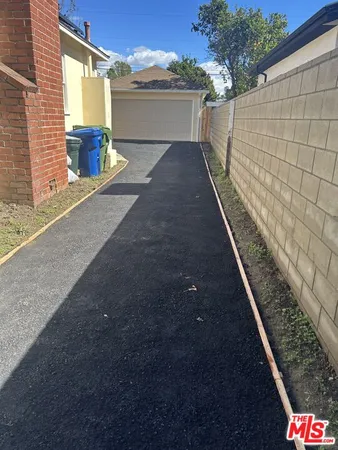 a bathroom with a sink and a window