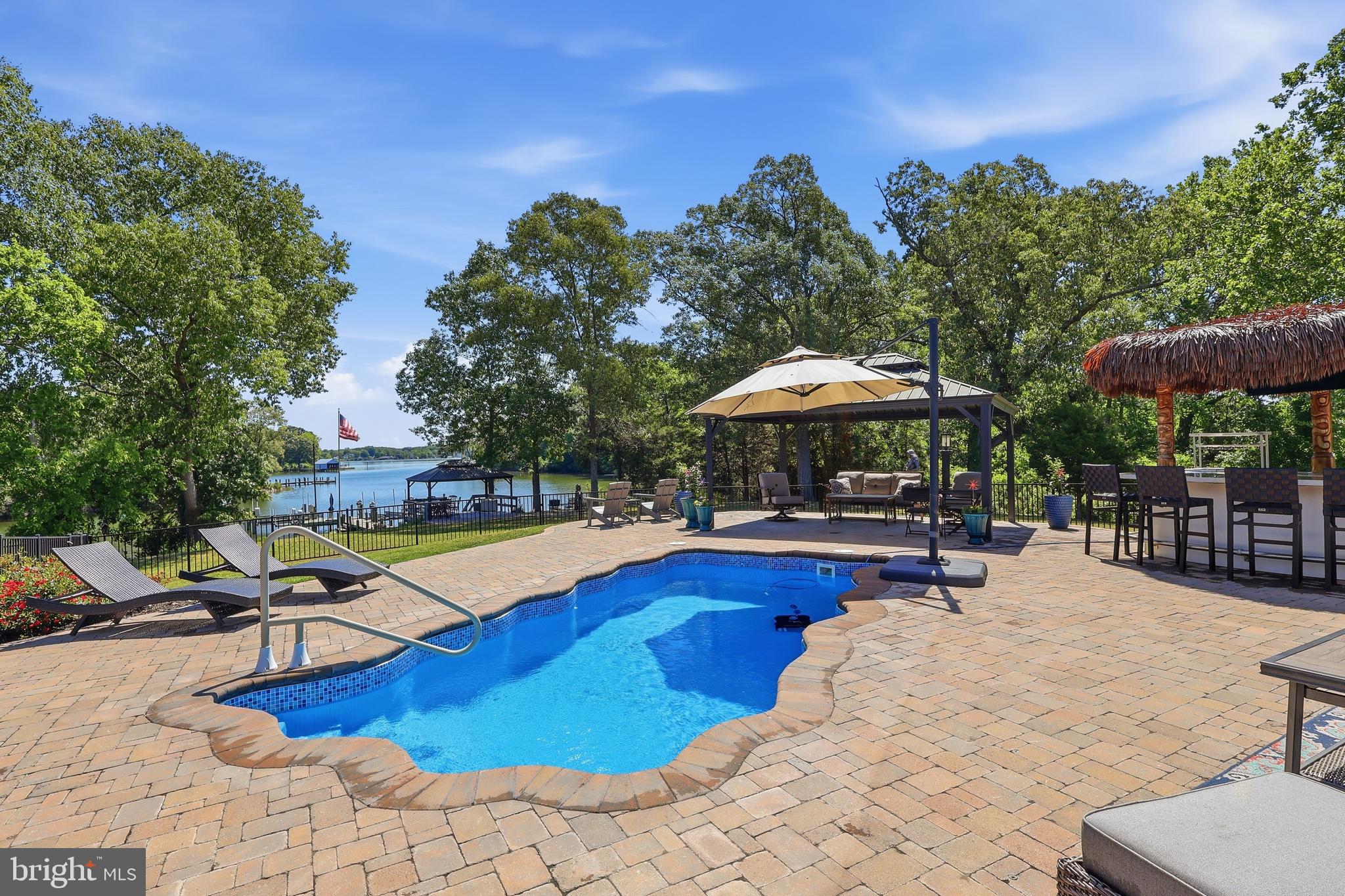 38980 Hodges Road Avenue, MD 20609 - Photo 77 of 98 Extensive Paver patio w/pool to relax