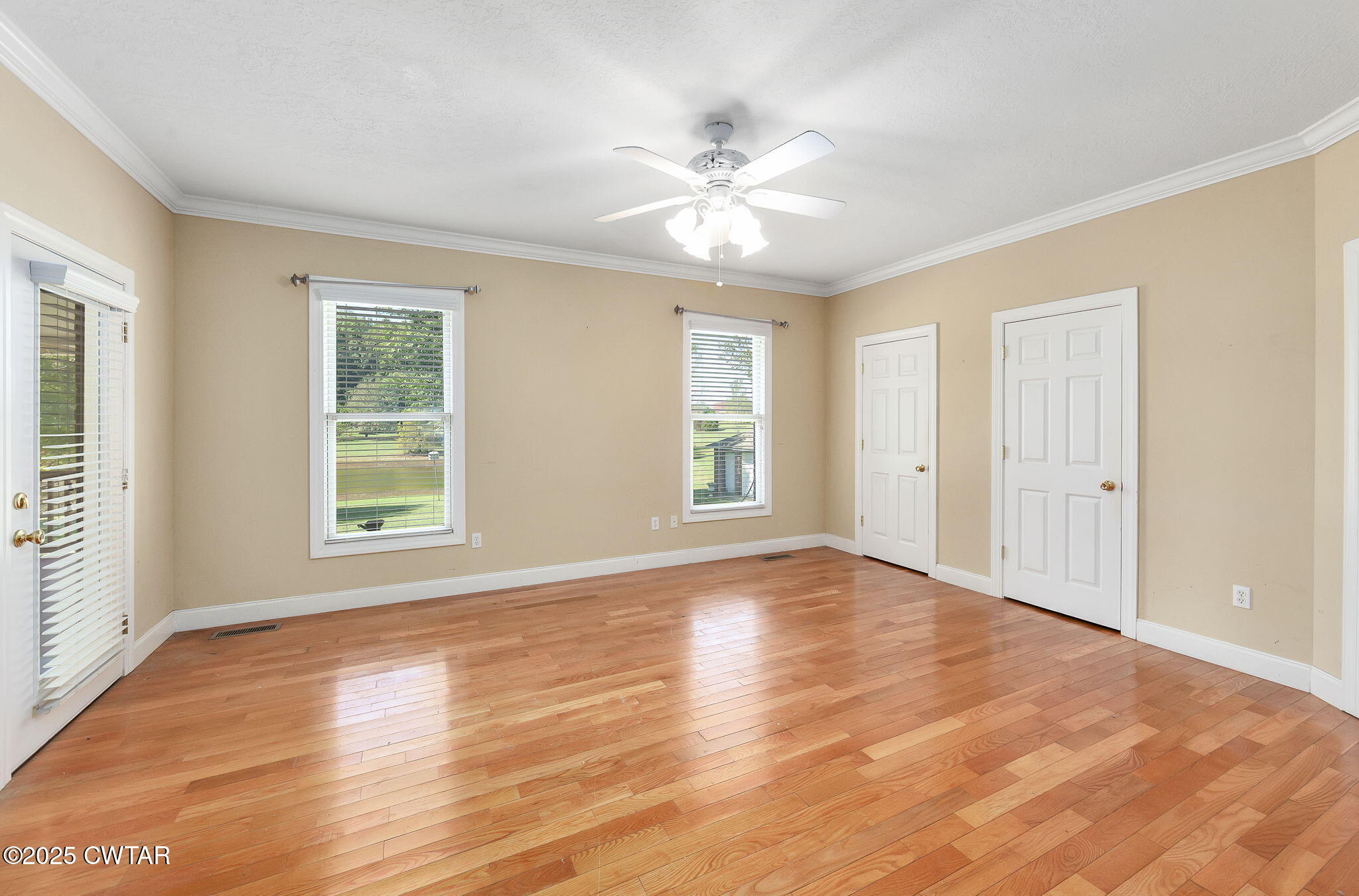 495 Sycamore Lane McKenzie, TN 38201 - Photo 13 of 21 a view of an empty room with wooden floor and a window
