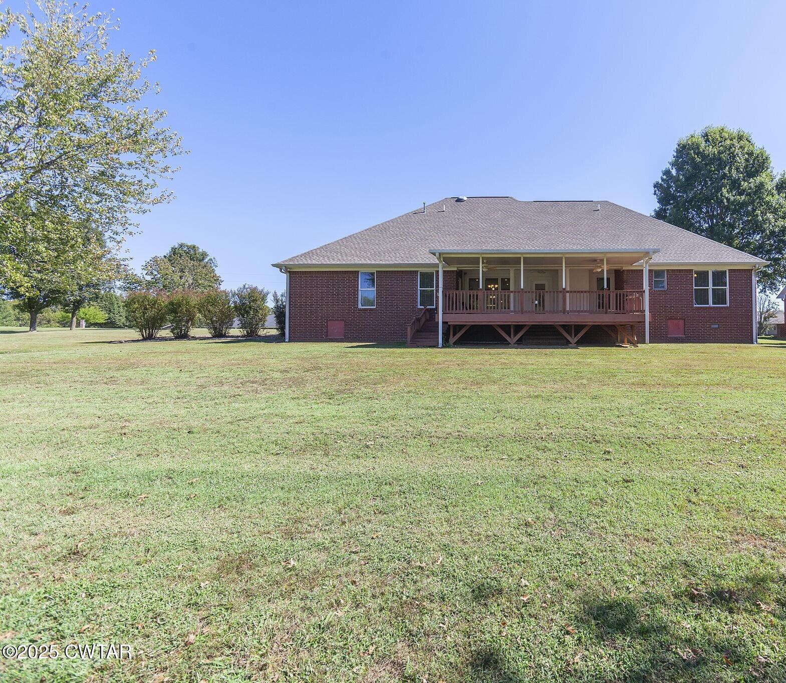 495 Sycamore Lane McKenzie, TN 38201 - Photo 18 of 21 a view of a house with a yard