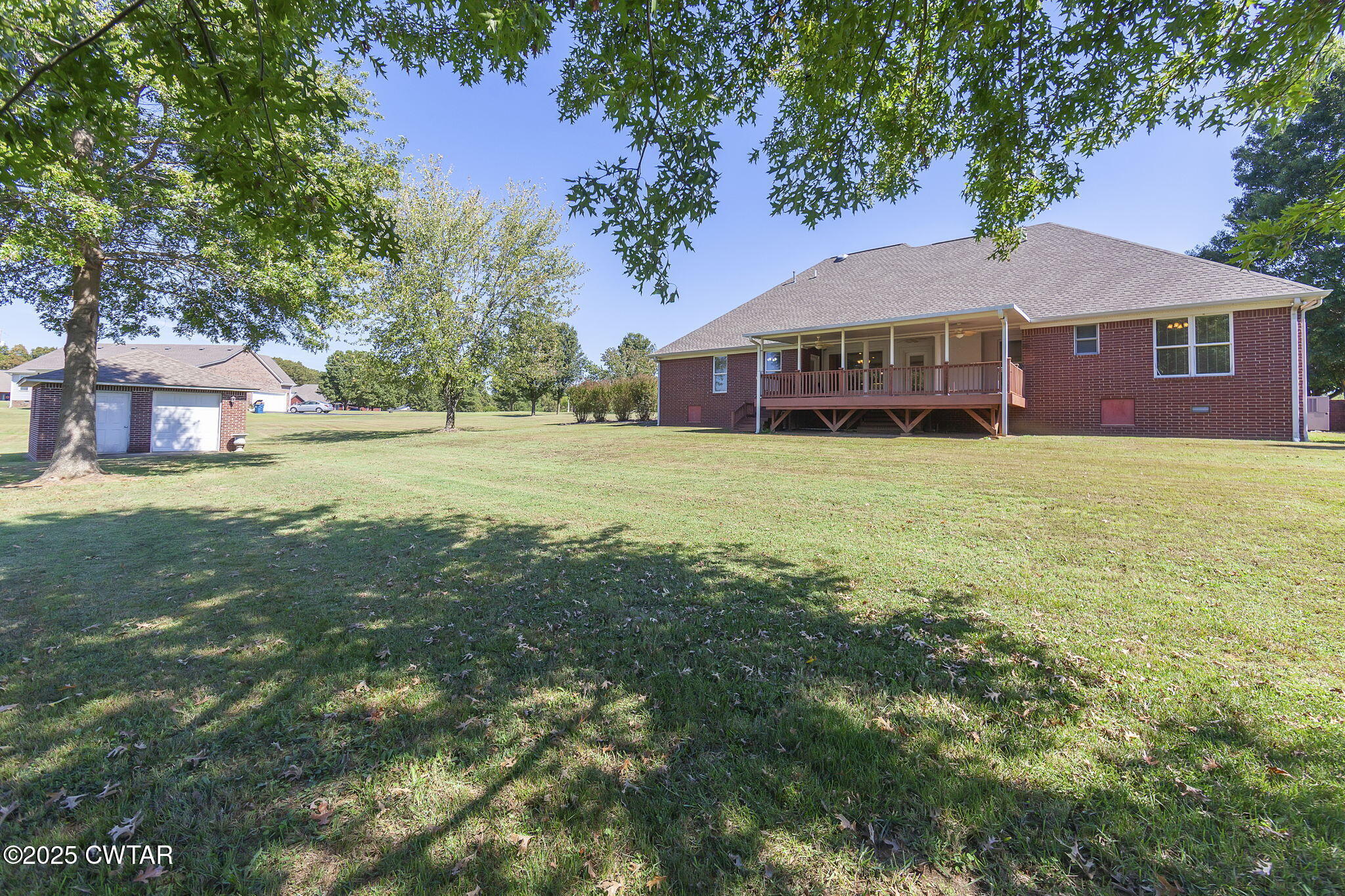 495 Sycamore Lane McKenzie, TN 38201 - Photo 19 of 21 a front view of a house with a garden