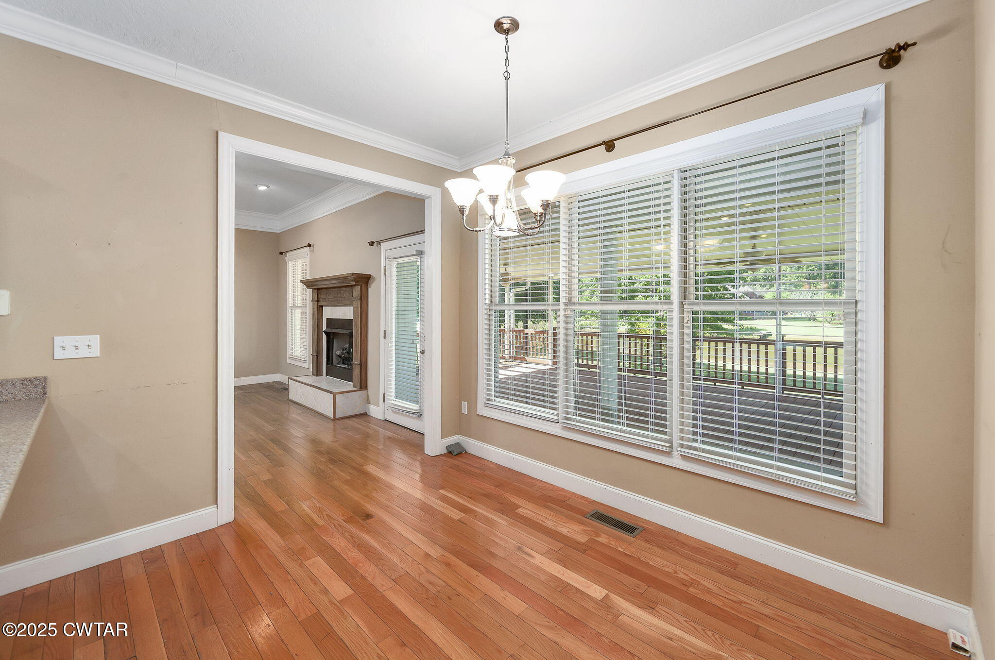 495 Sycamore Lane McKenzie, TN 38201 - Photo 8 of 21 a view of empty room with wooden floor and fan